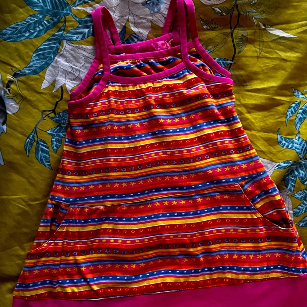 Sweet cotton dress. It has special detail of an inset bra-top. Great pockets!
